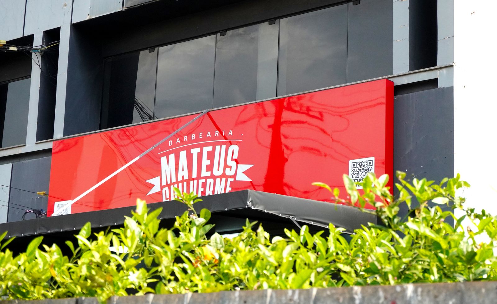Detalhe da identidade visual da Barbearia Mateus Guilherme